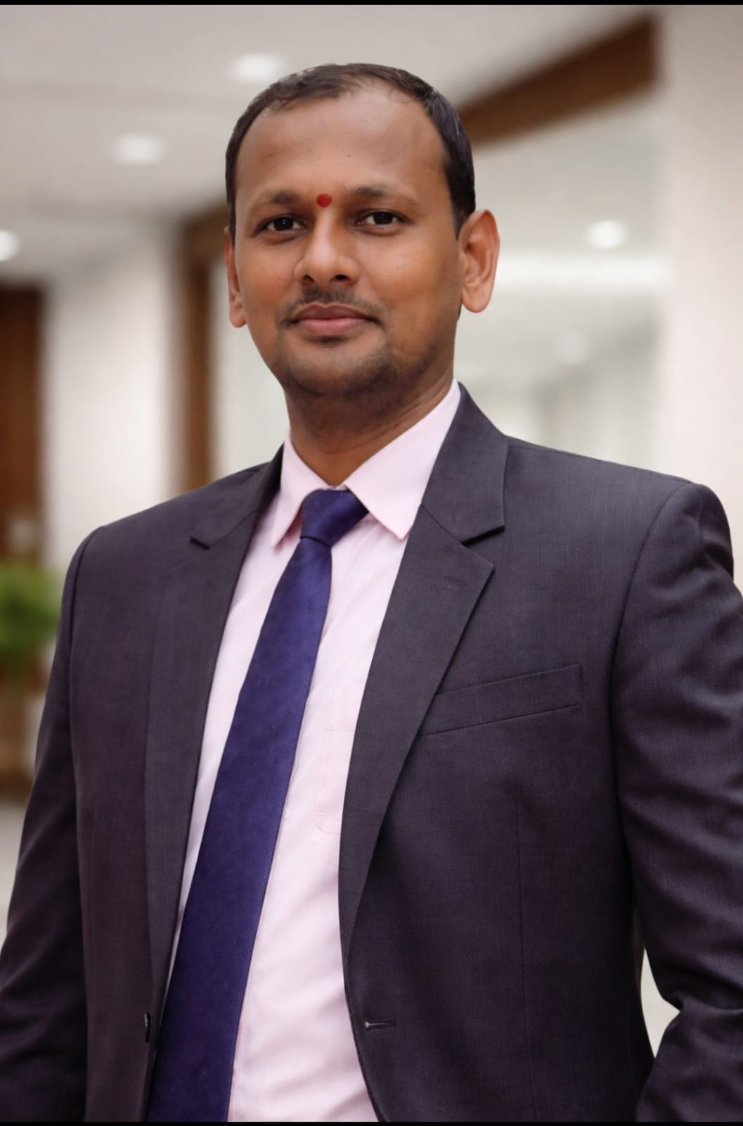 Mr. Naagendra Rao, Head of NEET and Senior Botany Faculty at Nidaan Career, in a professional portrait.